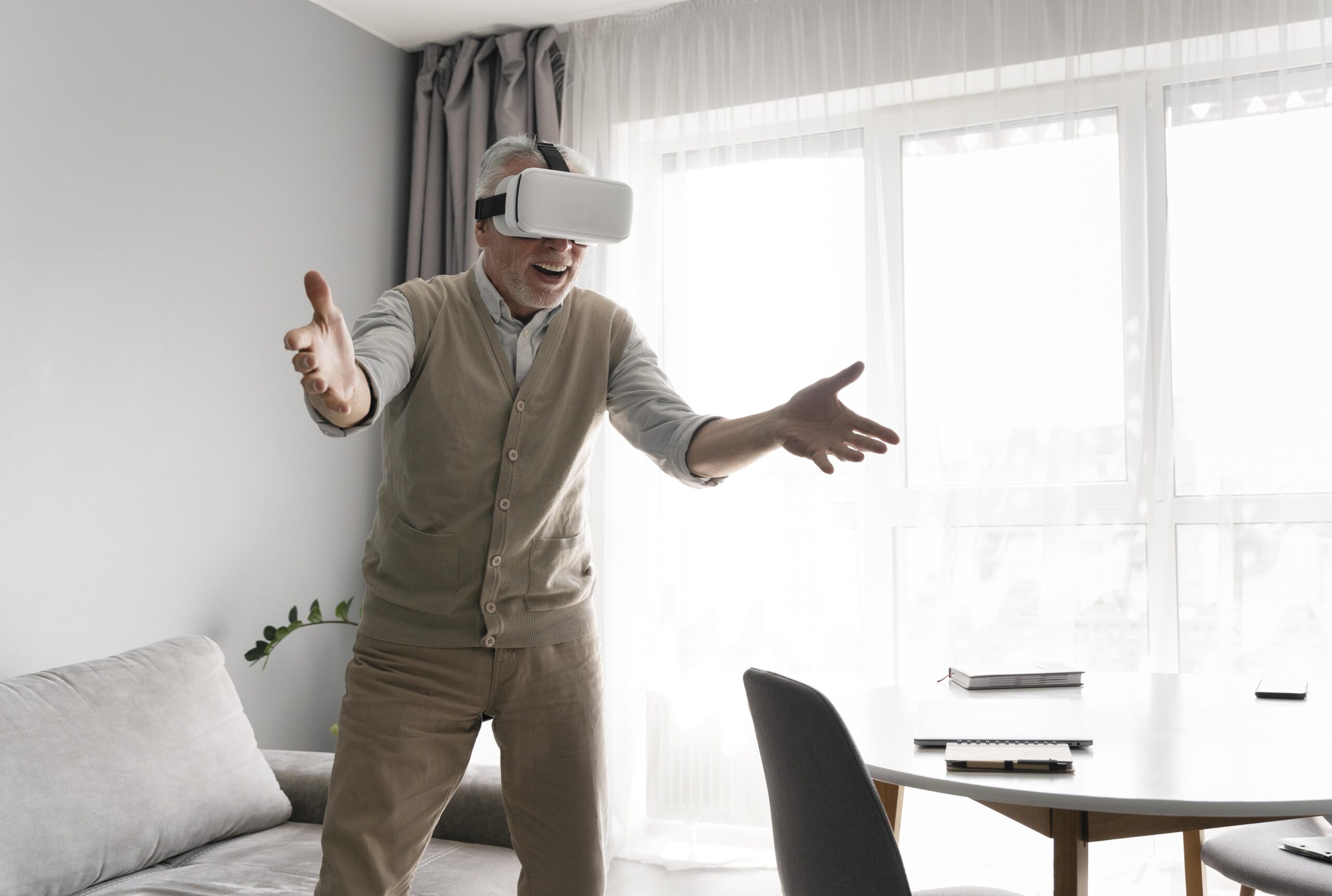 medium-shot-man-wearing-vr-glasses-indoors